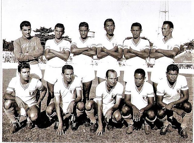 a black and white photo of a soccer team