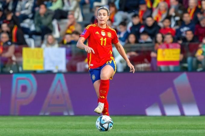 a female soccer player in action on the field