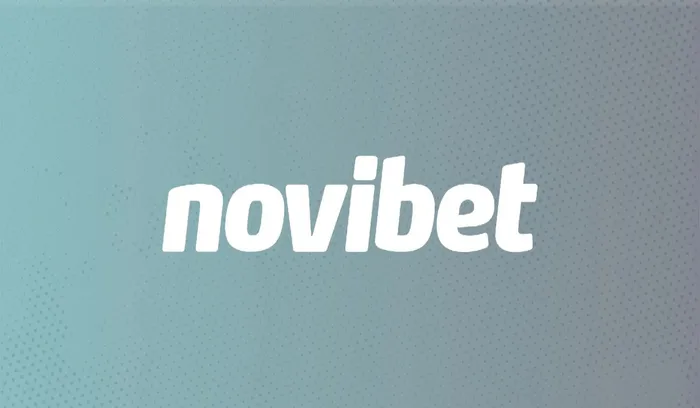 a white novibet logo on a blue background