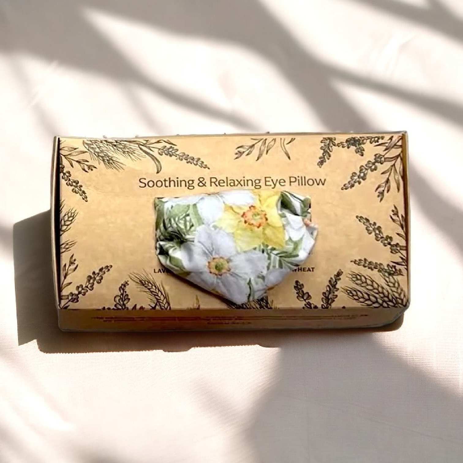 a box with a flower on it sitting on a table