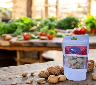 a bag of nuts sitting on top of a wooden table