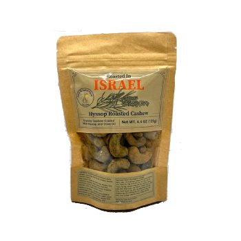 a bag of roasted cashews on a white background