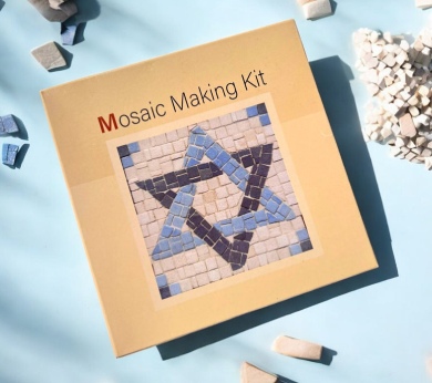 a mosaic making kit with a star of david on it