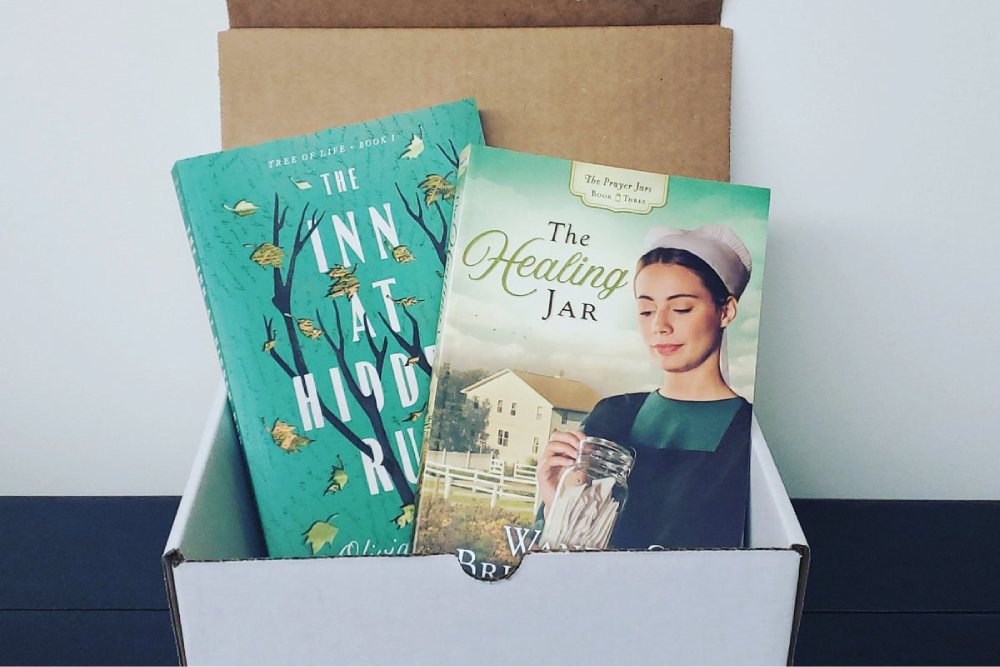 a box filled with books sitting on top of a table