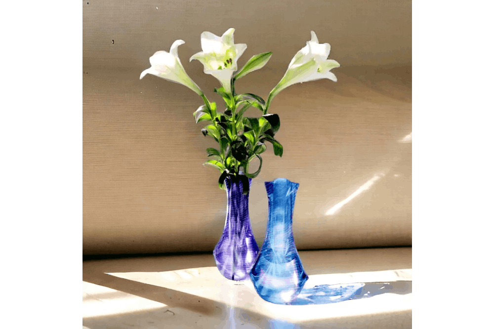 a couple of vases that are sitting on a table