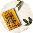 a wooden book with a picture of a building on it