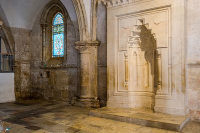 Remains of the Cenacle room with stone walls, marble floors, and stained-glass windows