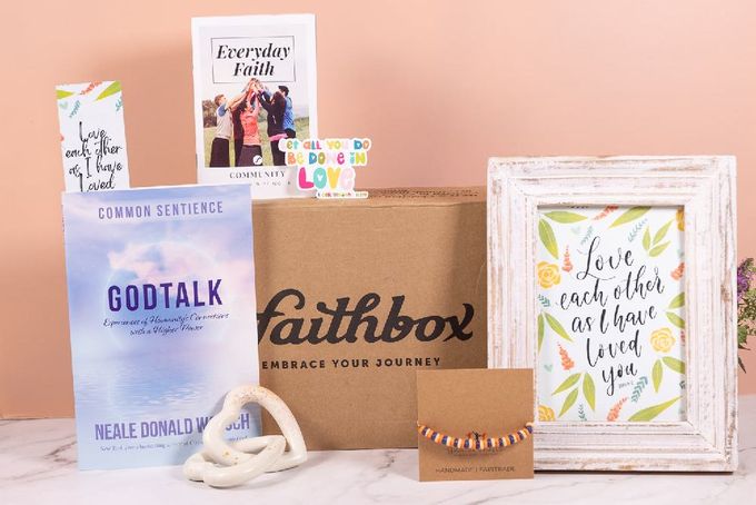 A Faithbox Christian subscription box on a table.