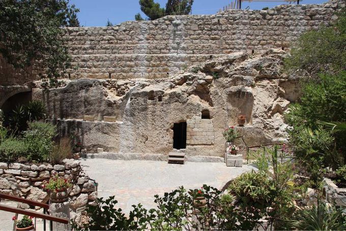 A stone building with steps leading up to it.