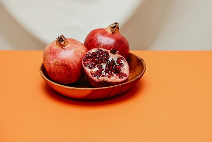 A bowl of pomegranates.