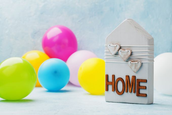 Balloons with a Christian housewarming gift