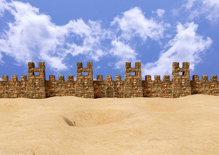 Jericho Israel Holy Land a castle made of bricks sitting on top of a sandy hill