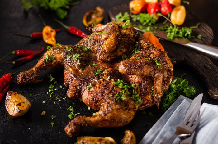 a close up of a chicken on a table