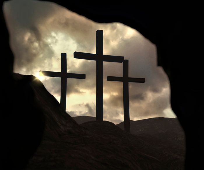 3 crosses as seen from the opening of a cave/tomb