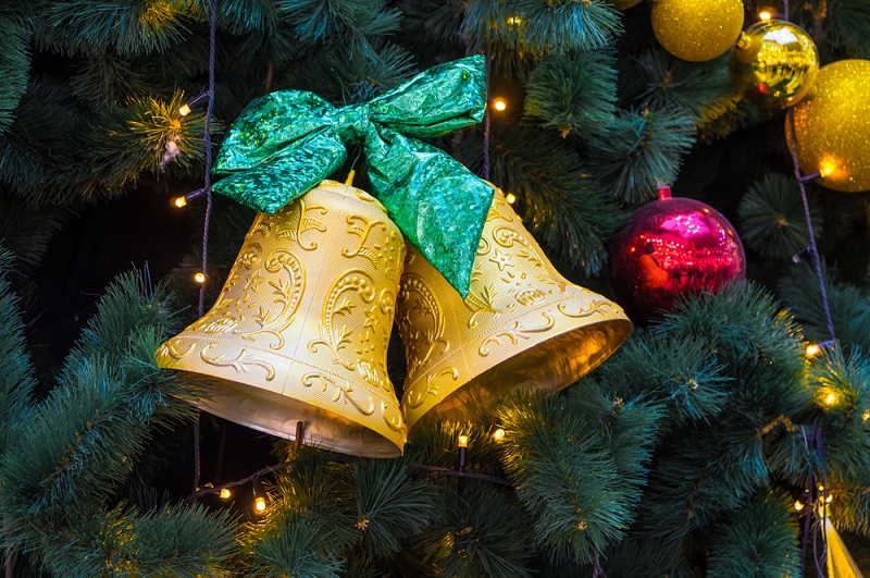 A golden Christmas bell ornament