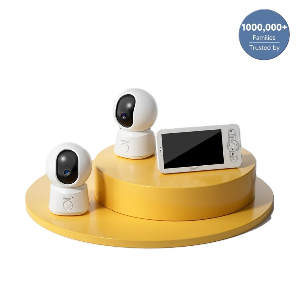 a couple of cameras sitting on top of a table