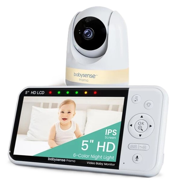a baby monitor sitting on top of a bed