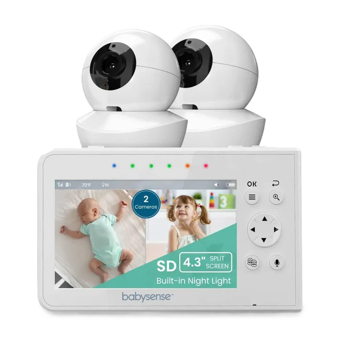 a baby monitor with two cameras on top of it