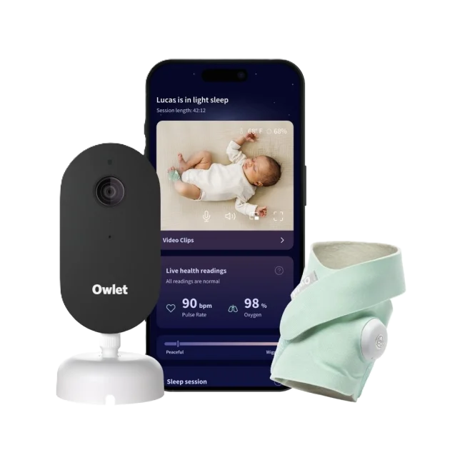 a baby monitor with a camera next to it