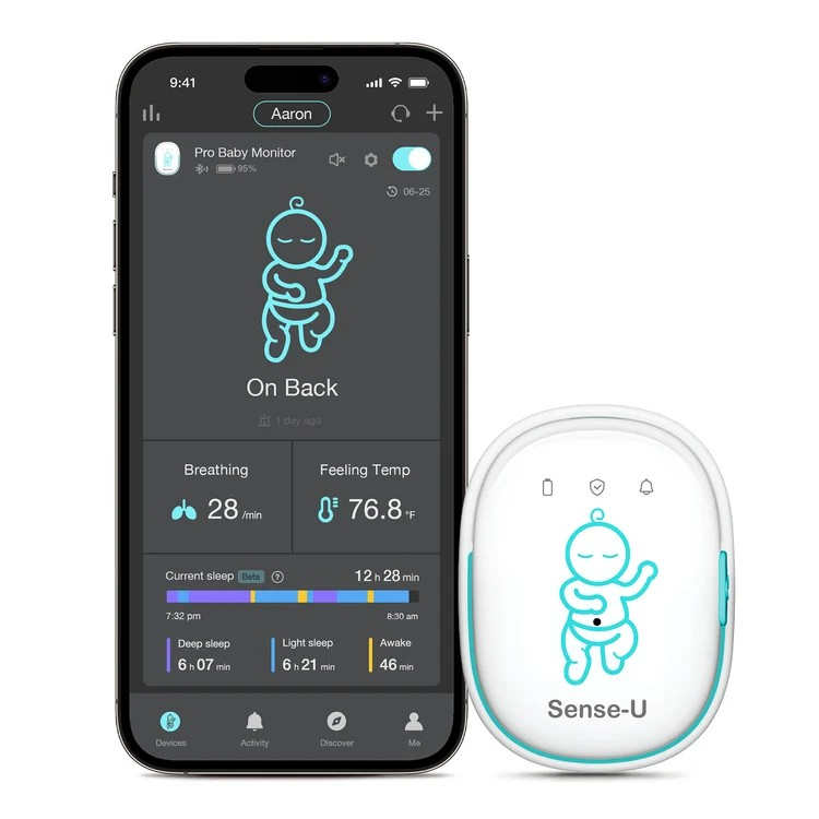 a phone with a baby monitor next to it
