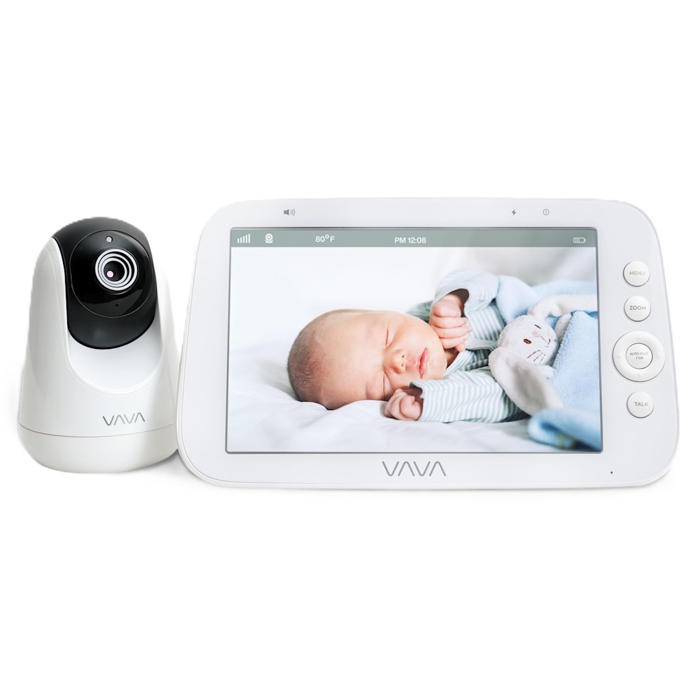 a baby monitor sitting next to a baby monitor