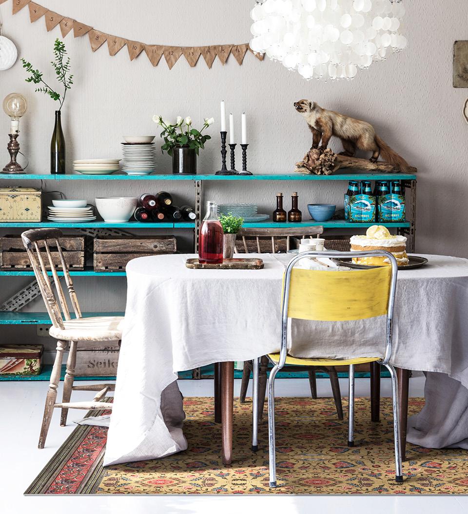 Intricately patterned boho-style rug under a festive dining table