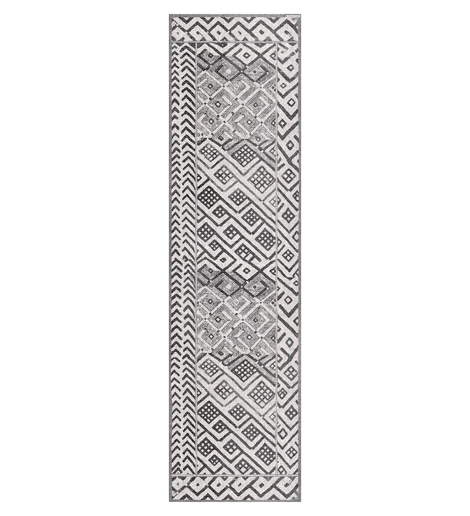 A stock image of a  gray table runner with a stony pattern 