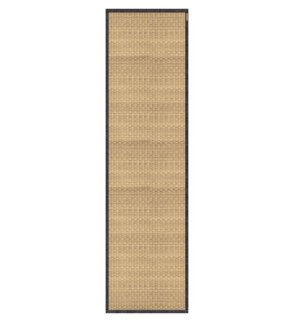 A stock image of a beige straw-looking table runner