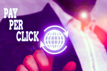 Man clicking on  a pay per click icon to increase revenue