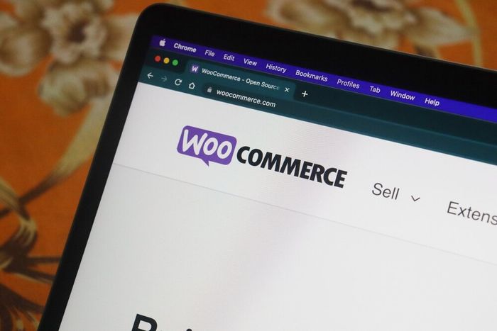 A laptop screen displaying the WooCommerce landing page.