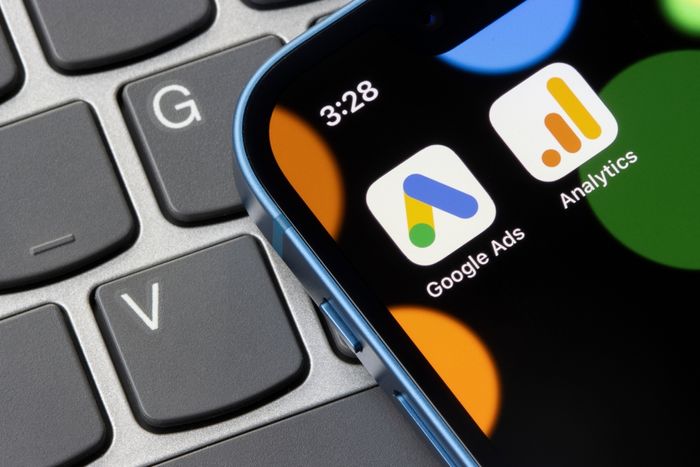 Google Ads and Google Analytics app icons are seen on iPhone