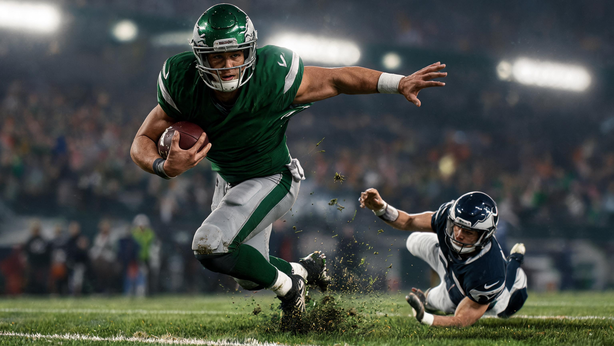 football player running with ball