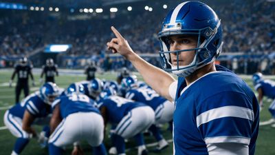 a football player pointing to his team on the field