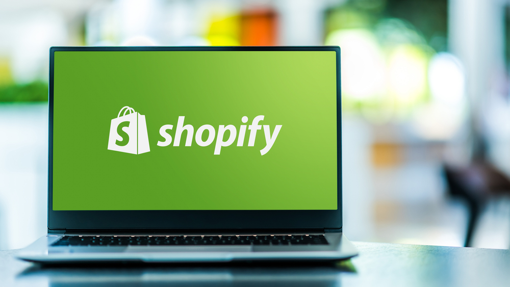 Shopify Logo displayed on a laptop
