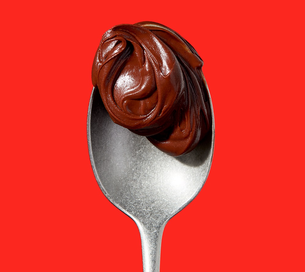 teaspoon with hazelnut cocoa spread 