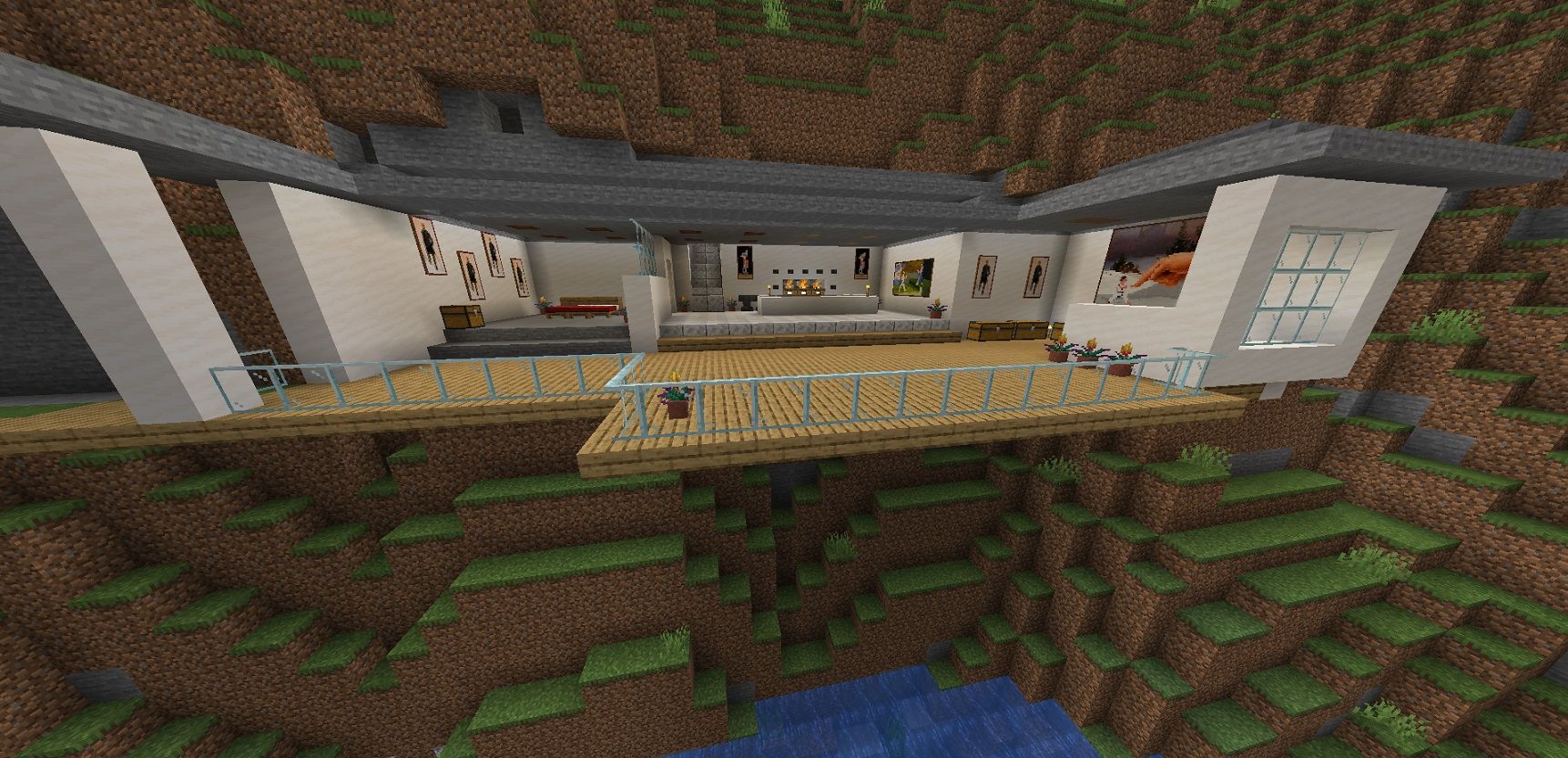 A house in Minecraft built into the side of a cliff