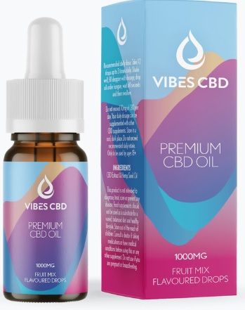 a bottle of vibes cbd oil next to a box