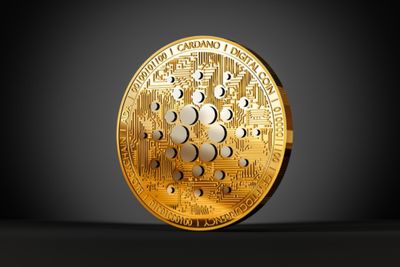 Shiny Cardano ADA golden coin on a black background