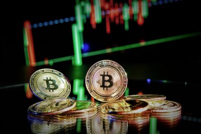 Stacks of Bitcoin with a digital background