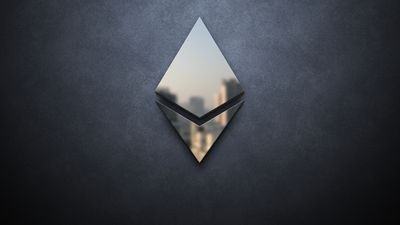 Silver Ethereum logo on a black background
