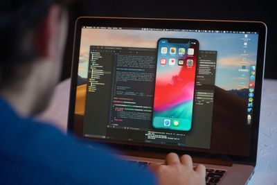Shopify store owner testing products on a Shopify development store and reviewing mobile optimization