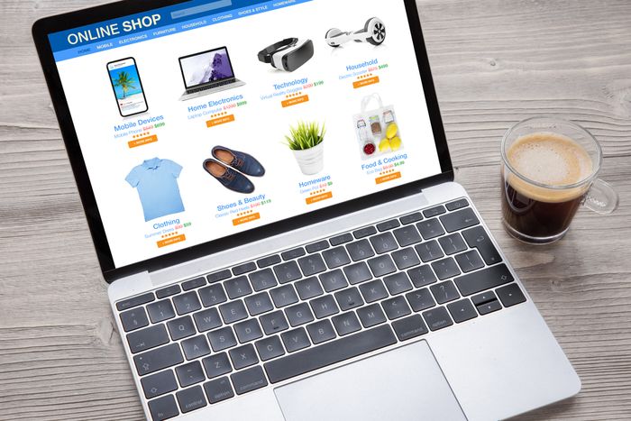 A laptop showing a Shopify store with product variant images