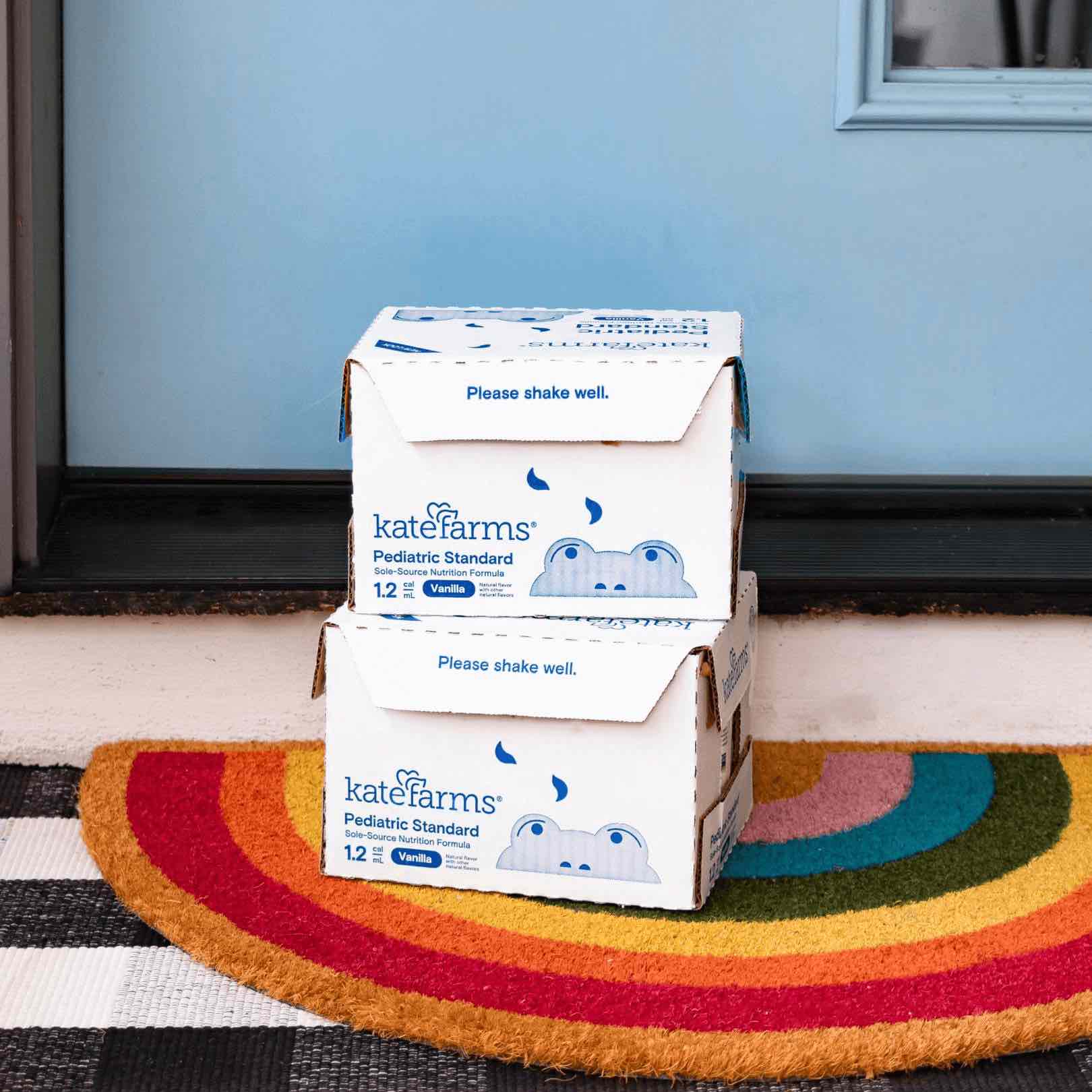 a couple of boxes sitting on top of a rug