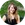 a woman in a black dress is smiling