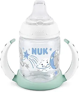 a baby bottle with a cartoon design on it
