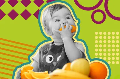 a young child eating a banana and orange