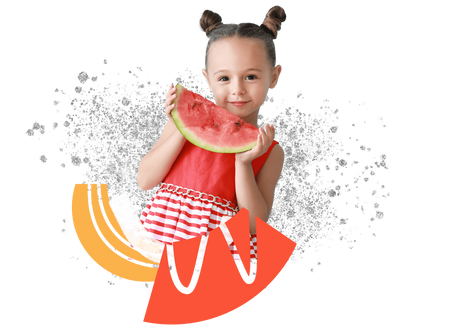 a little girl holding a slice of watermelon