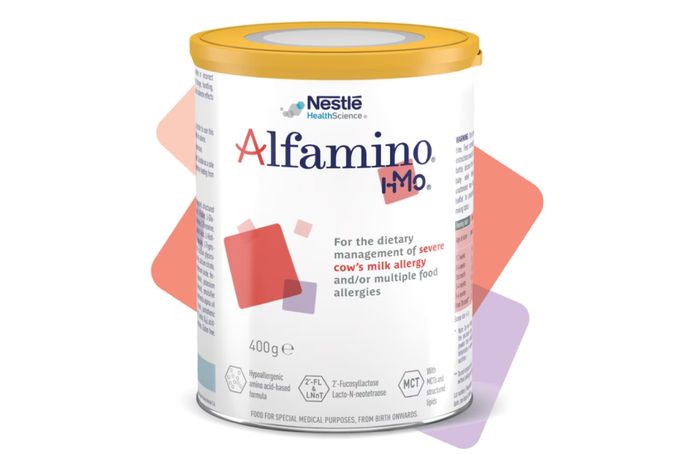 a can of alfamino mo with a yellow lid