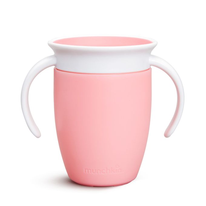 a pink cup with a white lid on a white background