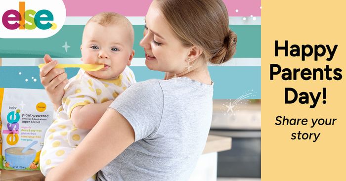 a woman feeding a baby with a spoon